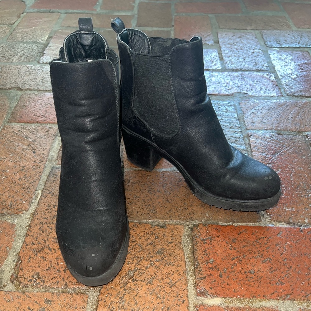 Worn Black Boots